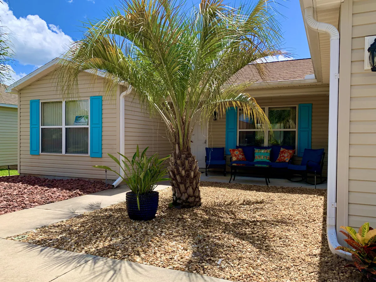 Front terrace with blue outdoor seating